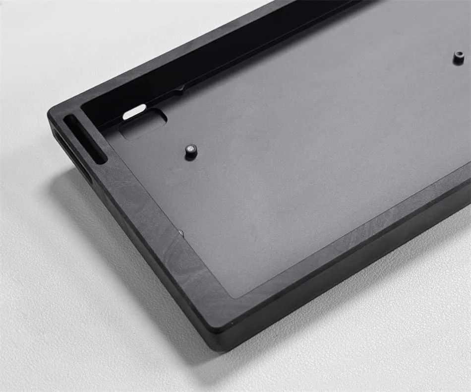 Internal mounting features and machined details of an aluminum keyboard case